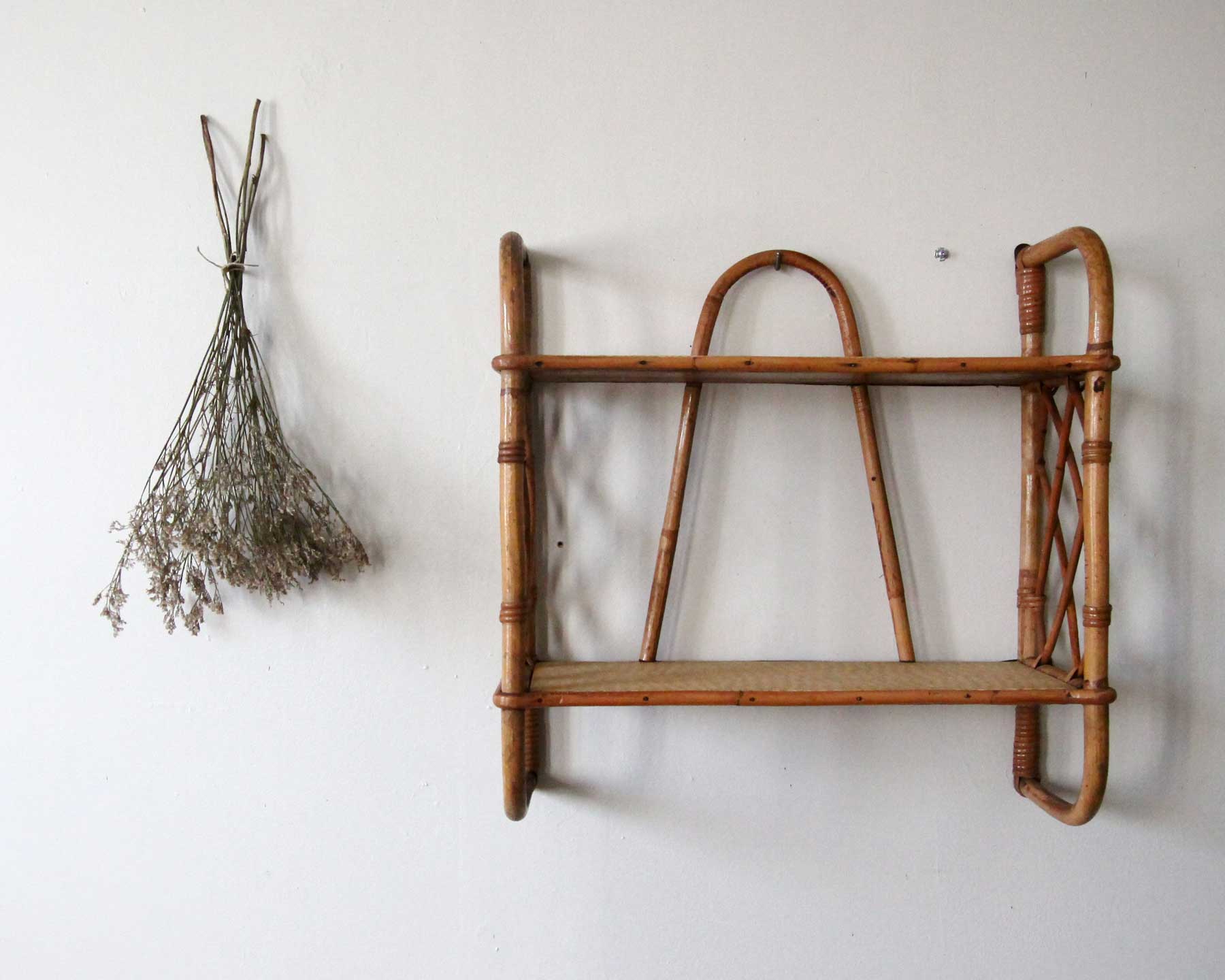 Rattan wall shelf