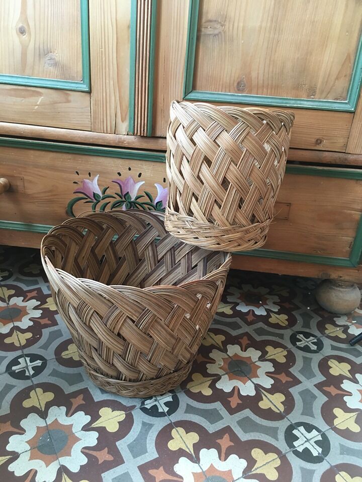 Two matching wicker pot covers