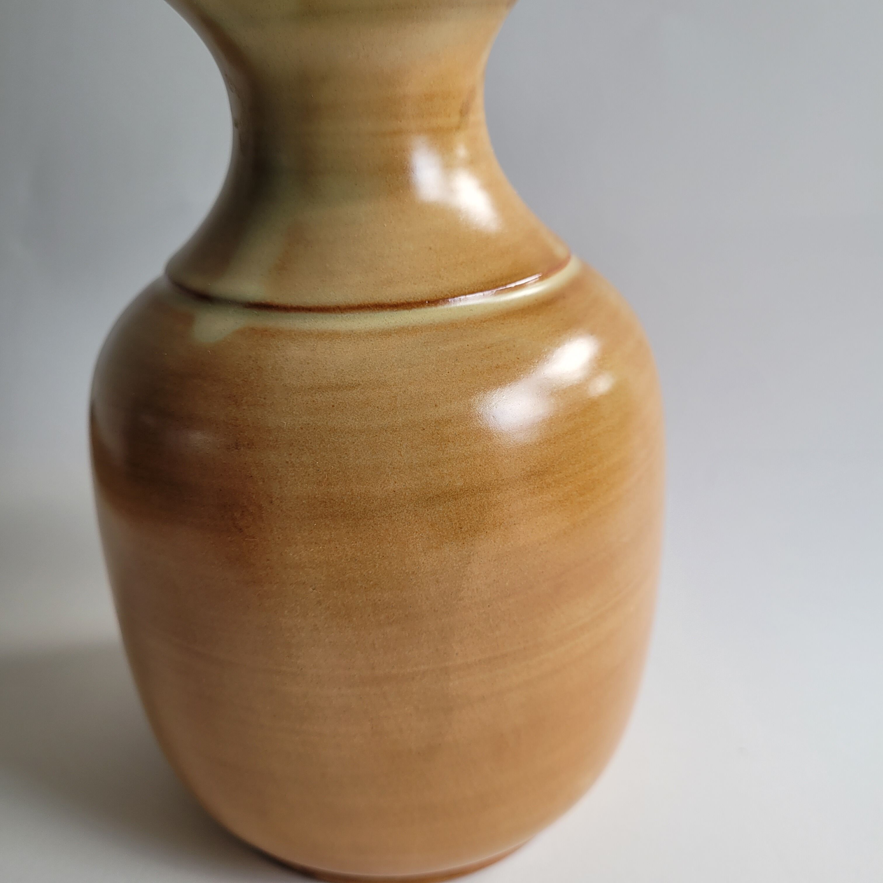 Enamelled sandstone vase