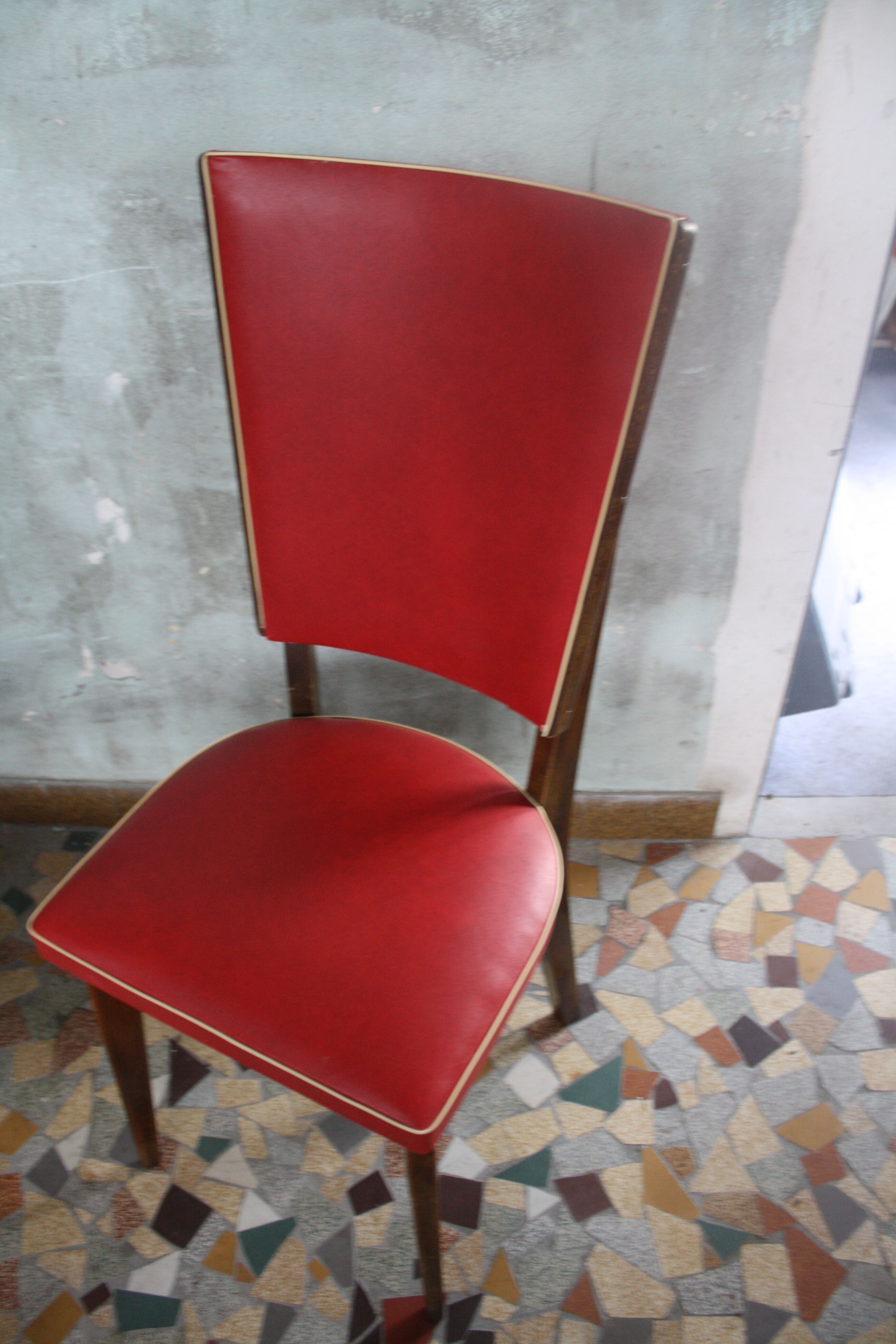 Lot of 8 vintage wooden chairs and red skai