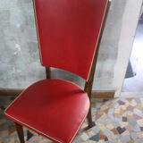 Lot of 8 vintage wooden chairs and red skai