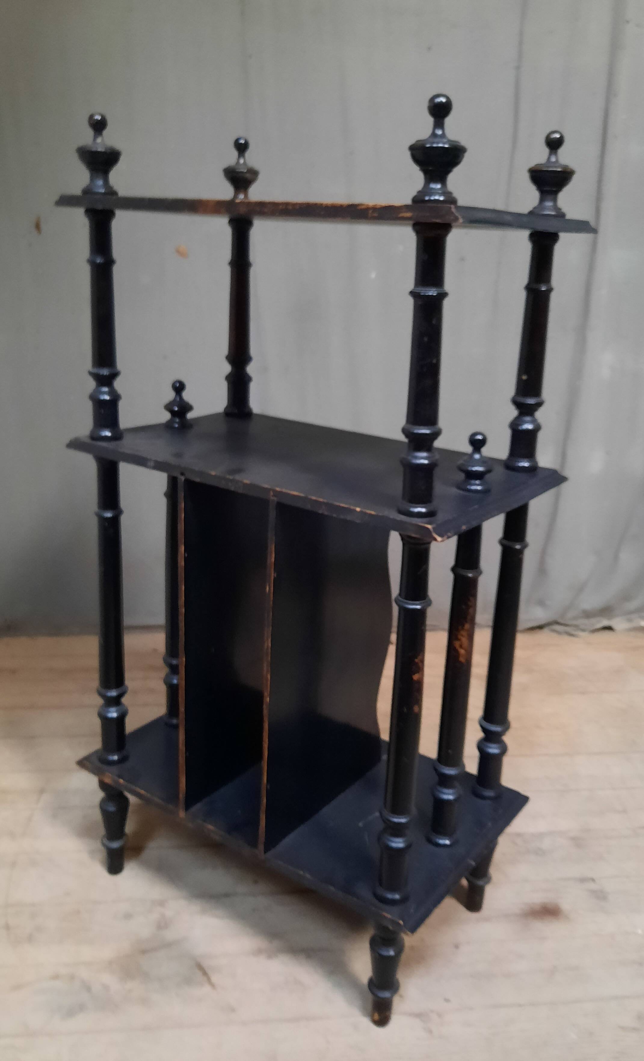 Blackened wooden shelf