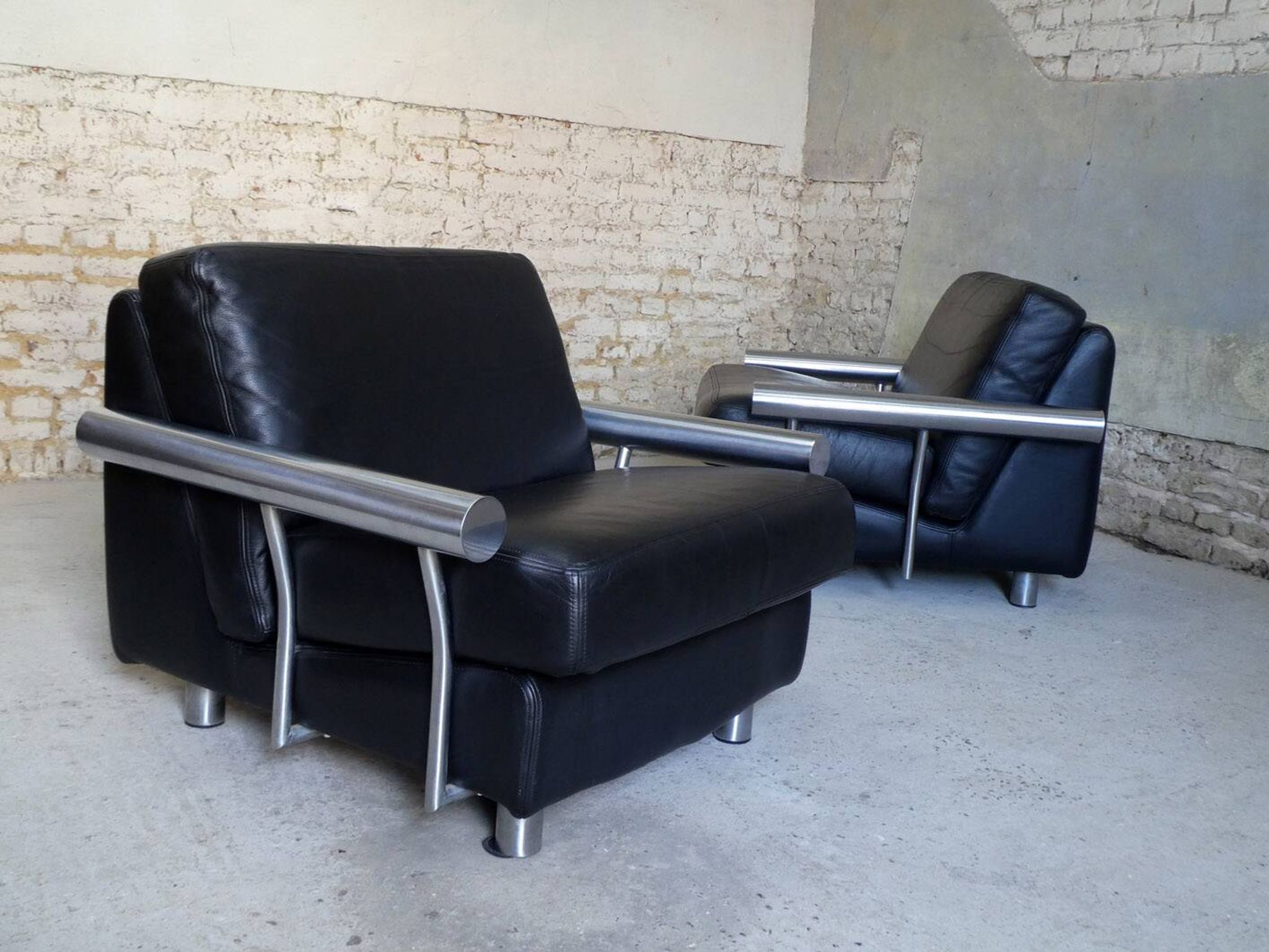 pair of armchairs, black leather & stainless steel, 1990