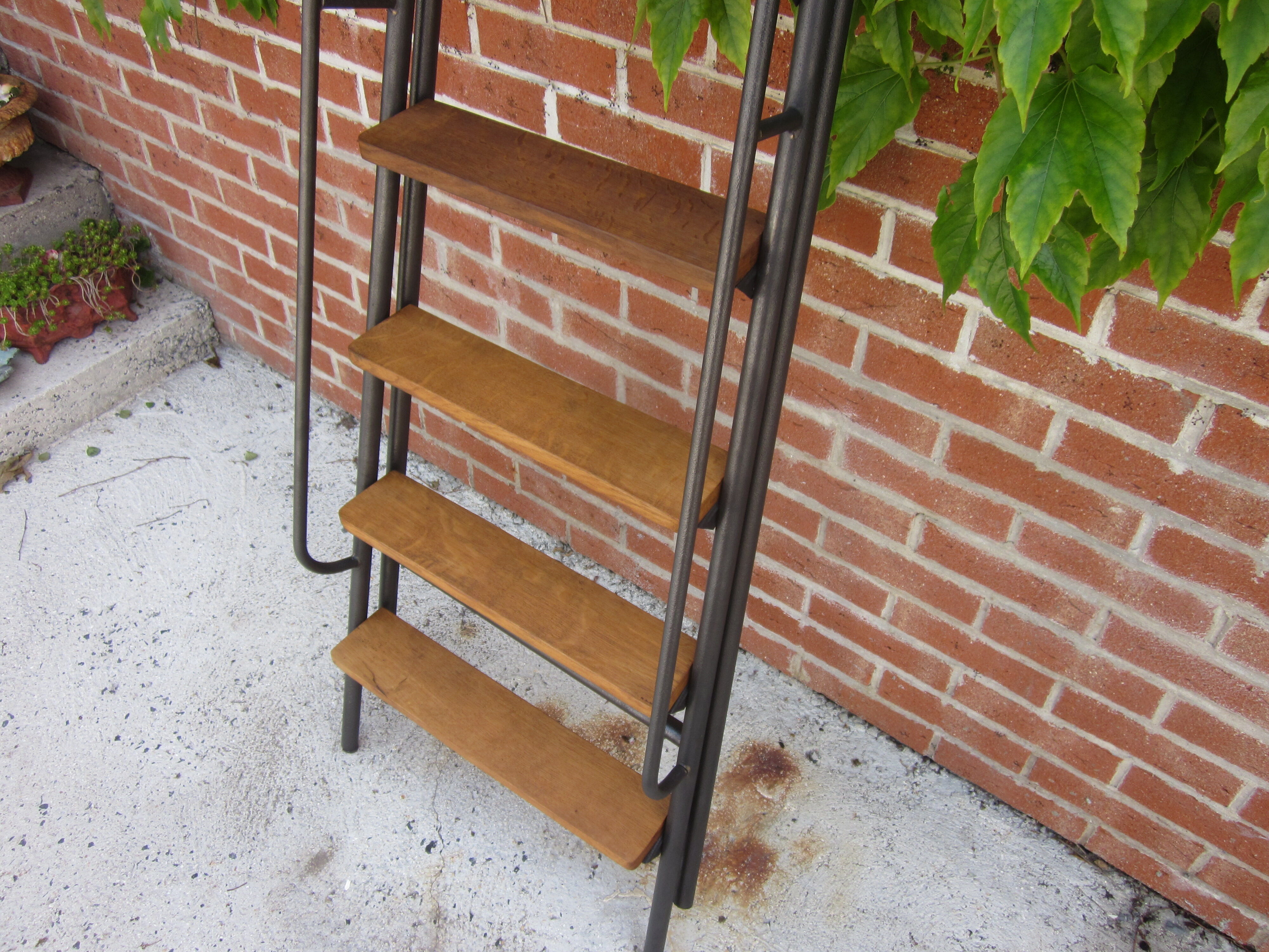 Old stepladder in metal and wood