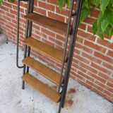 Old stepladder in metal and wood