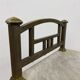 Brass bedside table with a marble top.