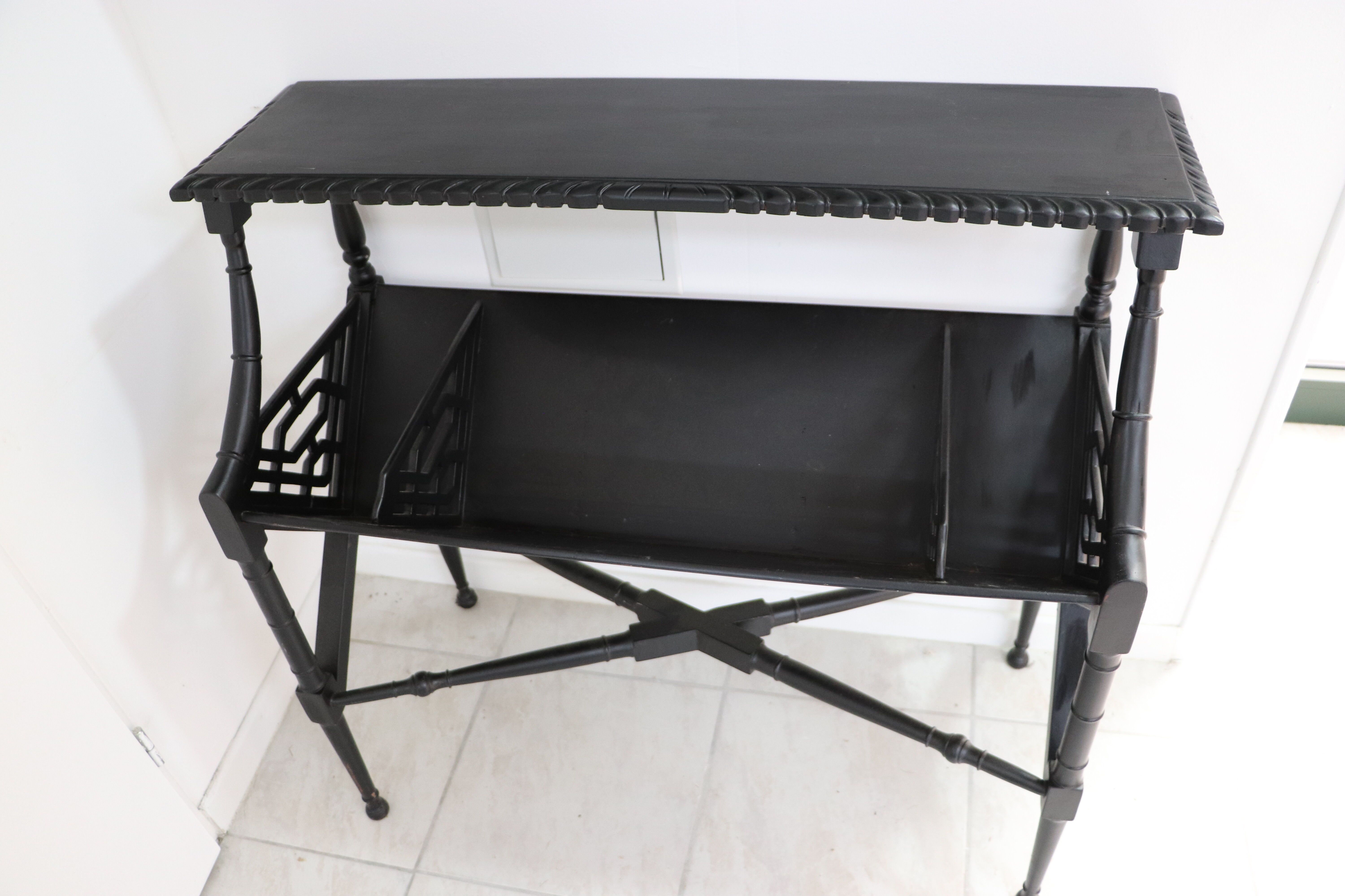 Black lacquered Indochinese console with disk storage