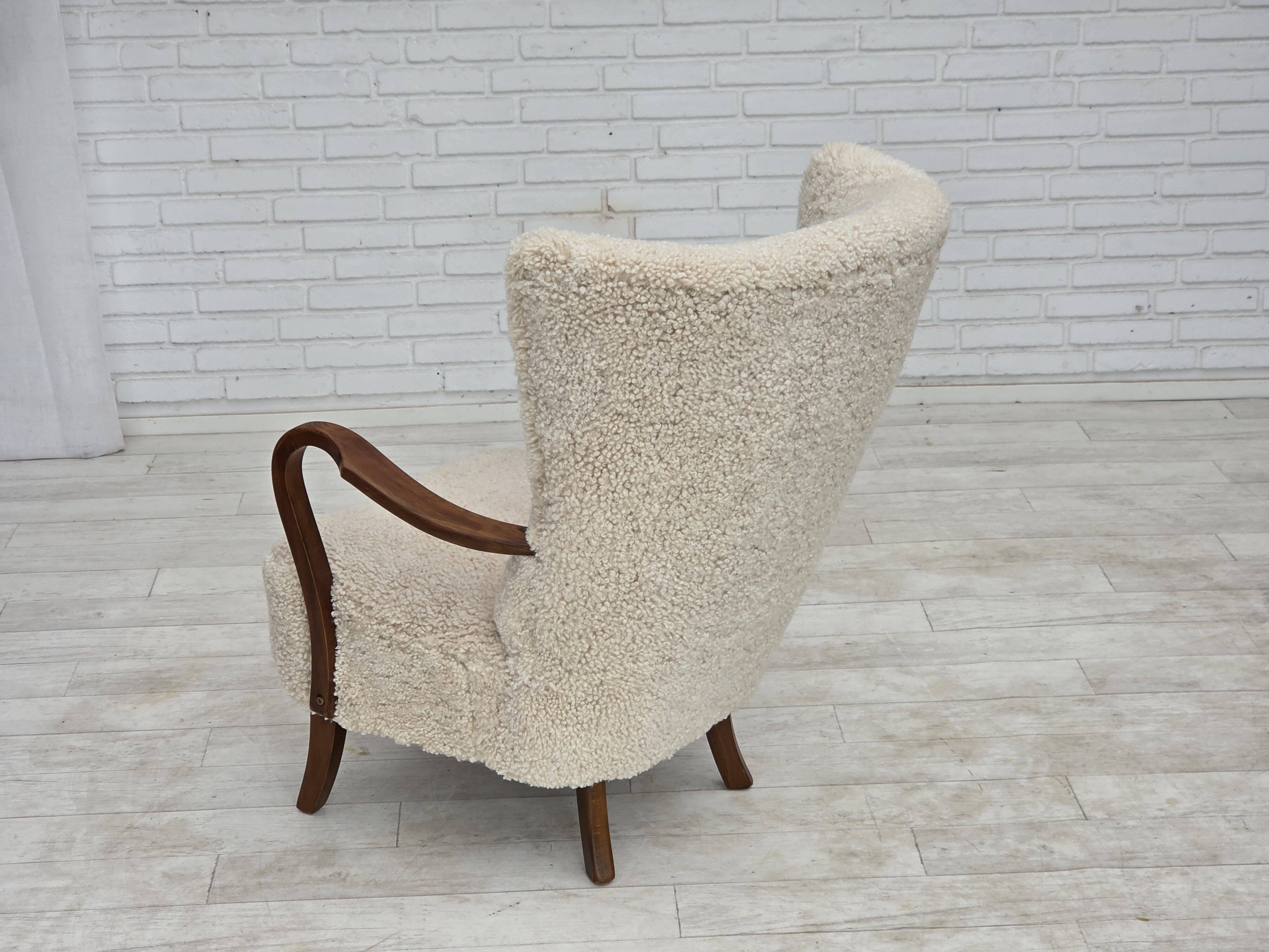 1960s, Danish design by Alfred Christensen, reupholstered, sheepskin.