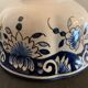 Old mustache cup and its under cup, Rouen earthenware