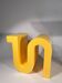 Yellow book or magazine holder by Axel Chay for Monorpix