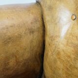Fauteuil ancien en cuir de mouton