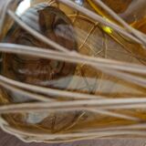 Catalan bottle in amber glass and wicker