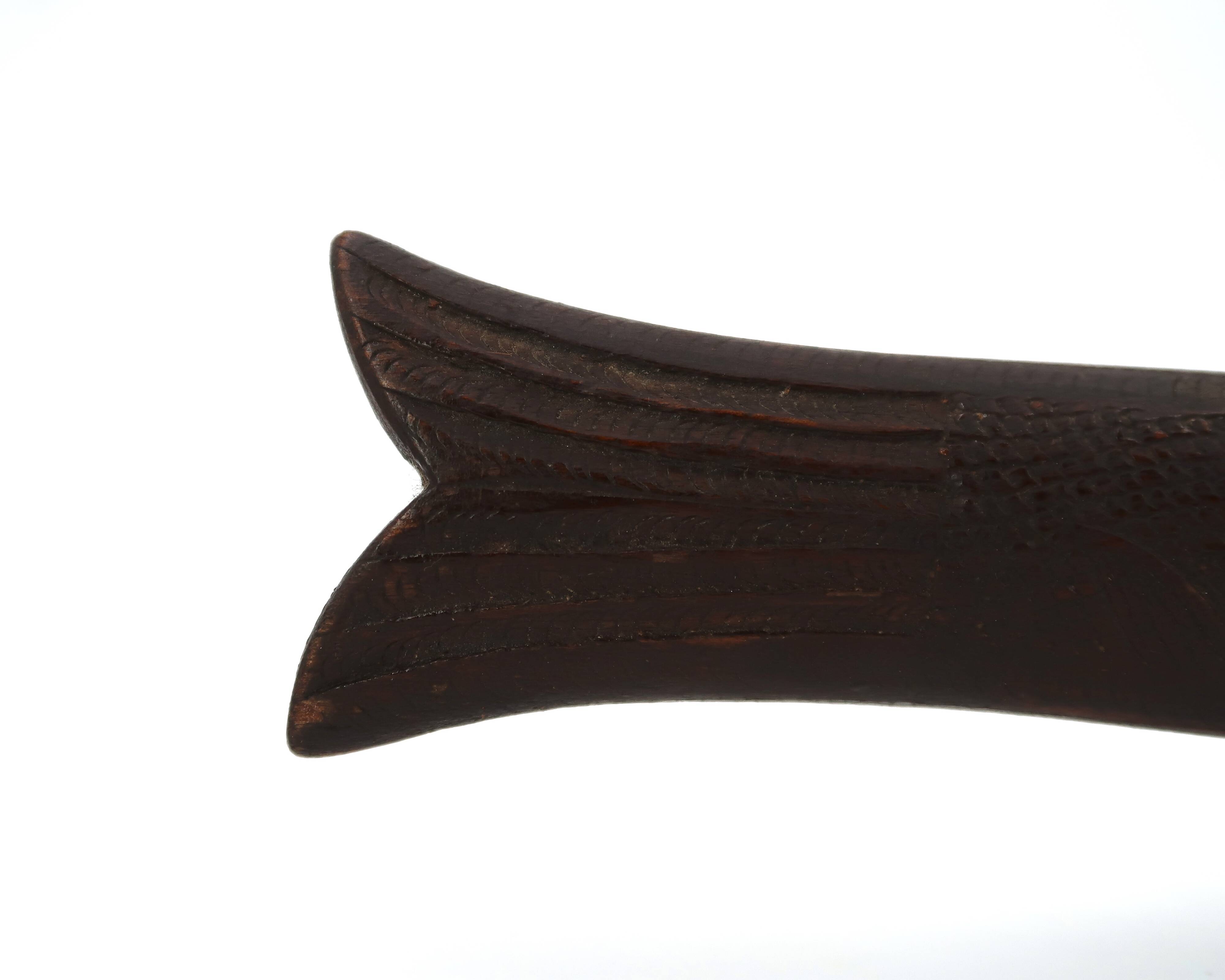 Fish knife and fork with a wooden and brass sheath sculpture.