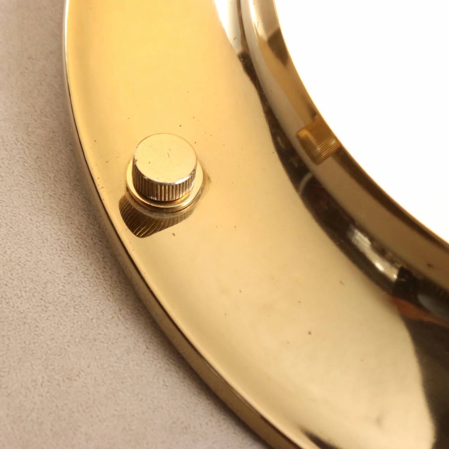 Vintage wall light in aluminium, brass, and glass, 1970s design.