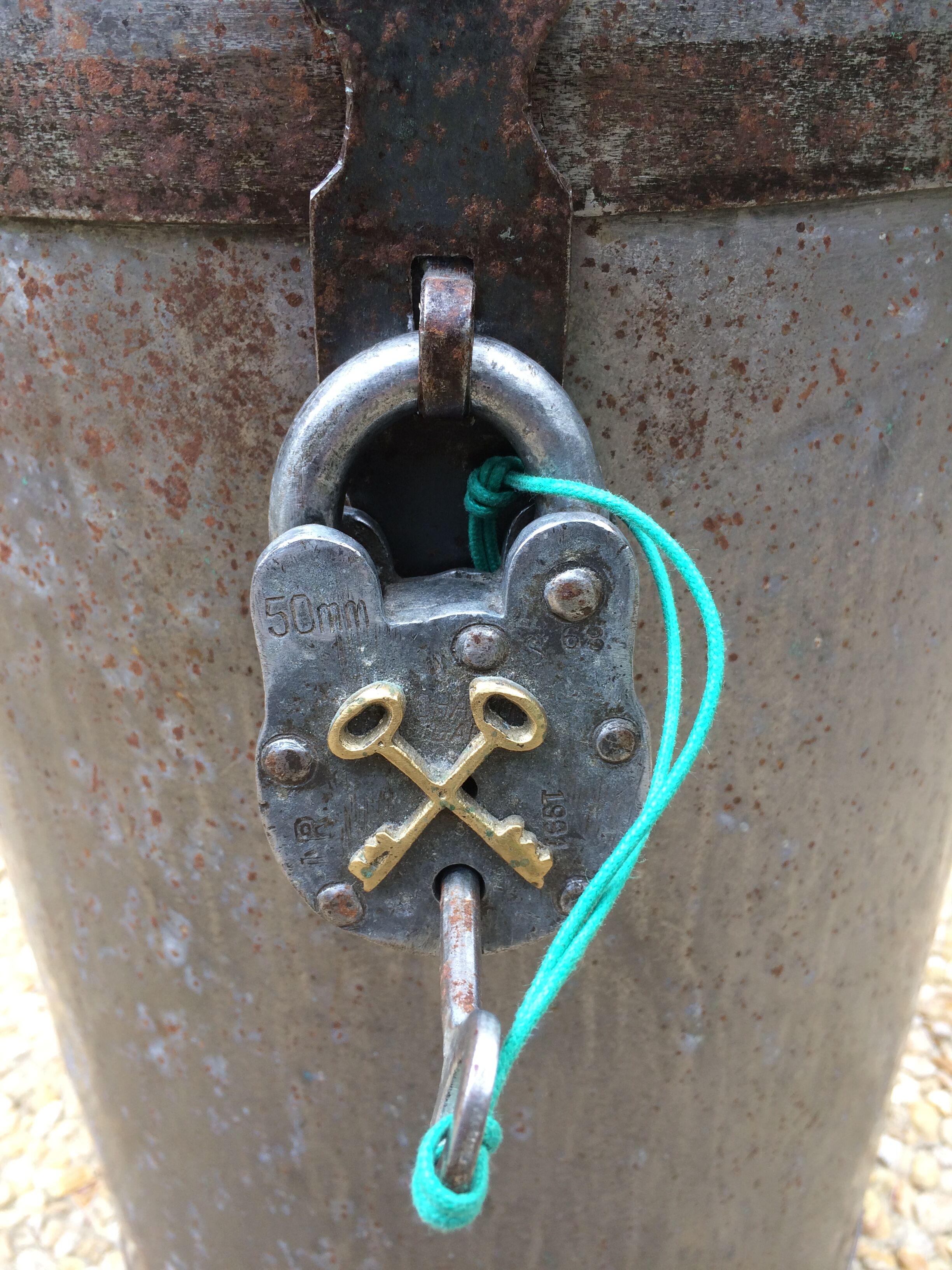 Round box industrial metal barrel with solid padlock