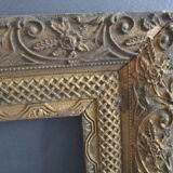 Old frame in wood and gilded stucco