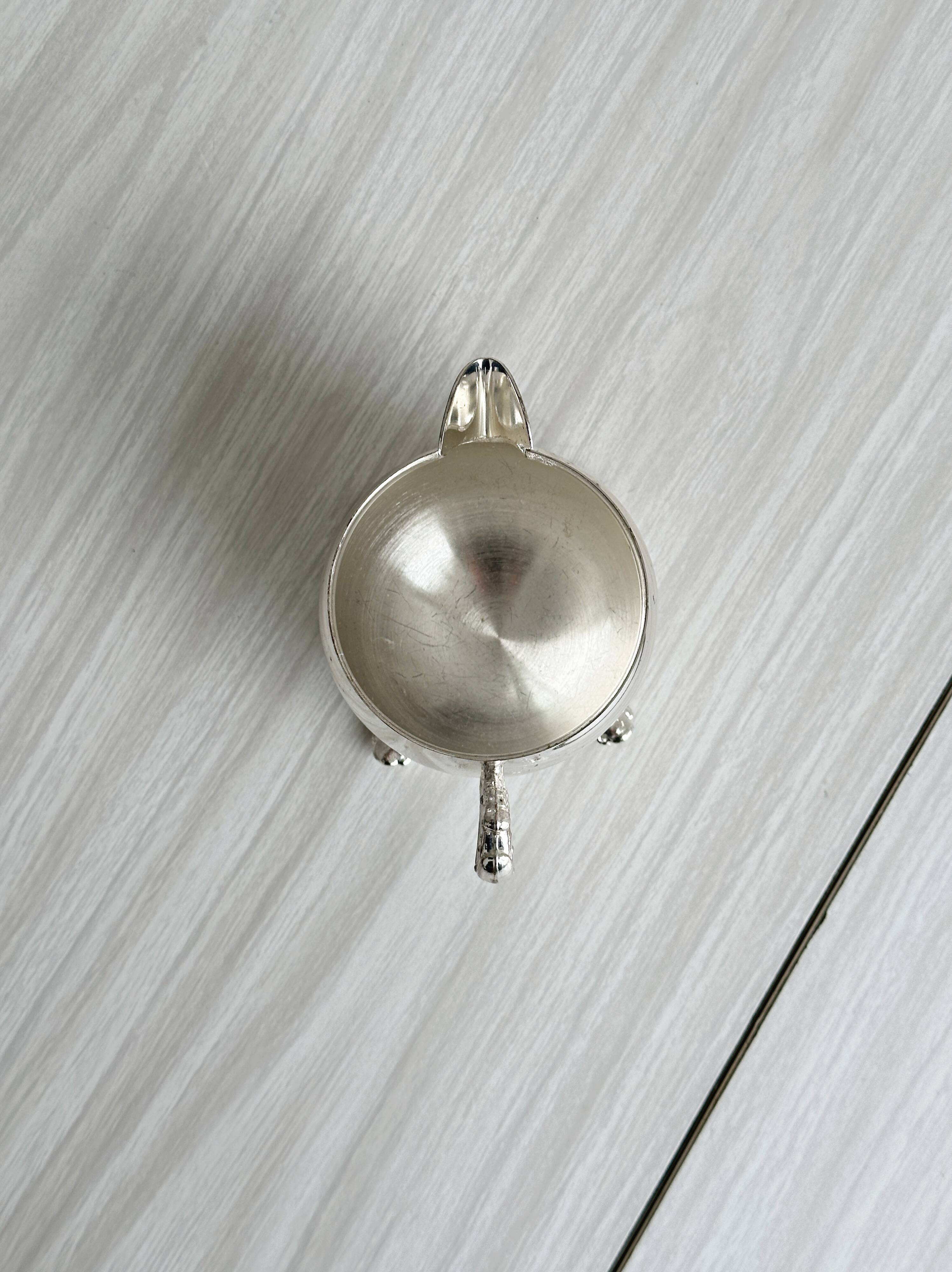 Antique metal sugar bowl