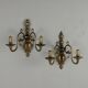 Pair of antique wall sconces in 20th-century Baroque style.