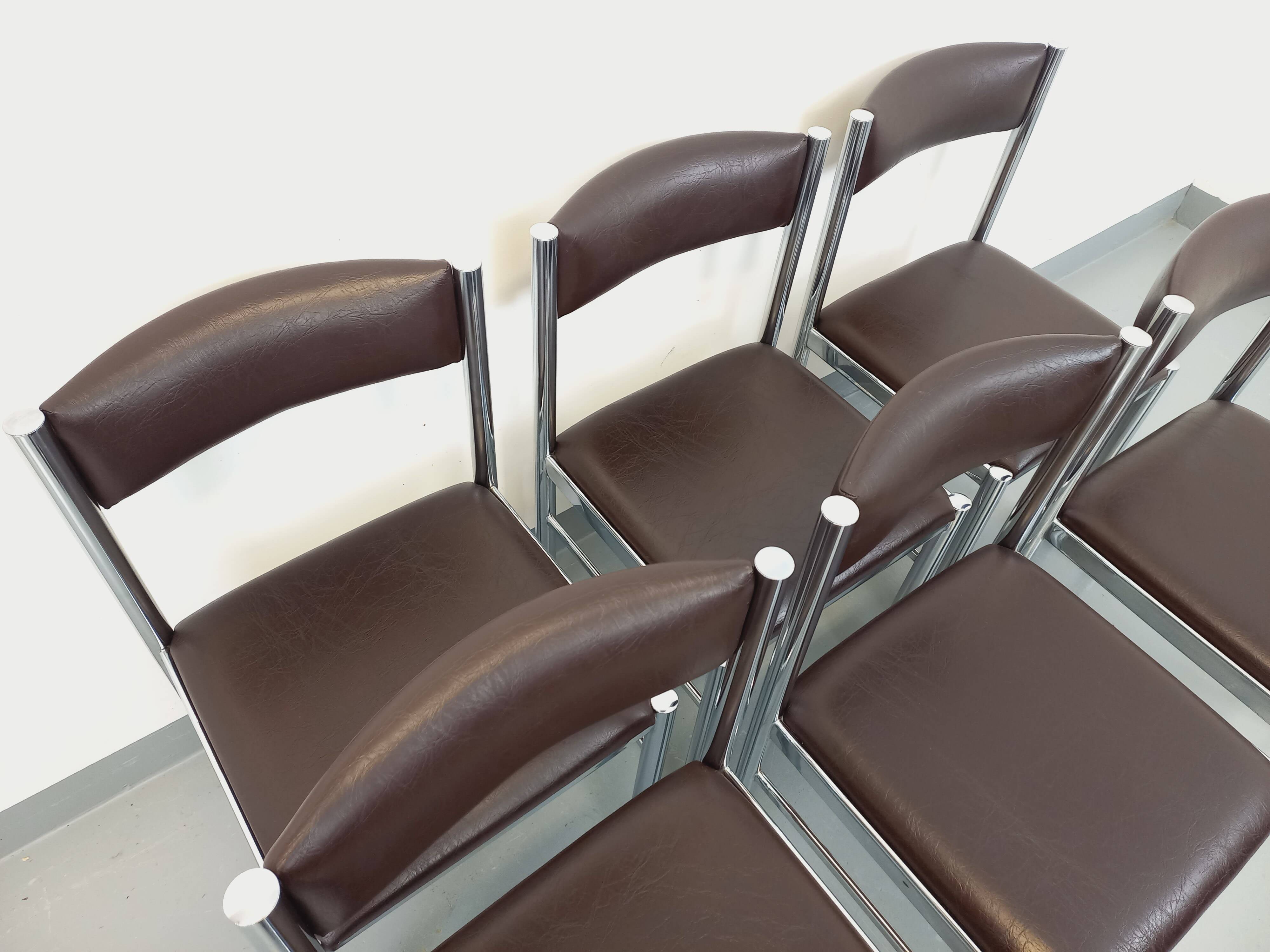 Set of 6 vintage chairs from the 70s in chrome metal and brown faux leather.