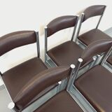 Set of 6 vintage chairs from the 70s in chrome metal and brown faux leather.