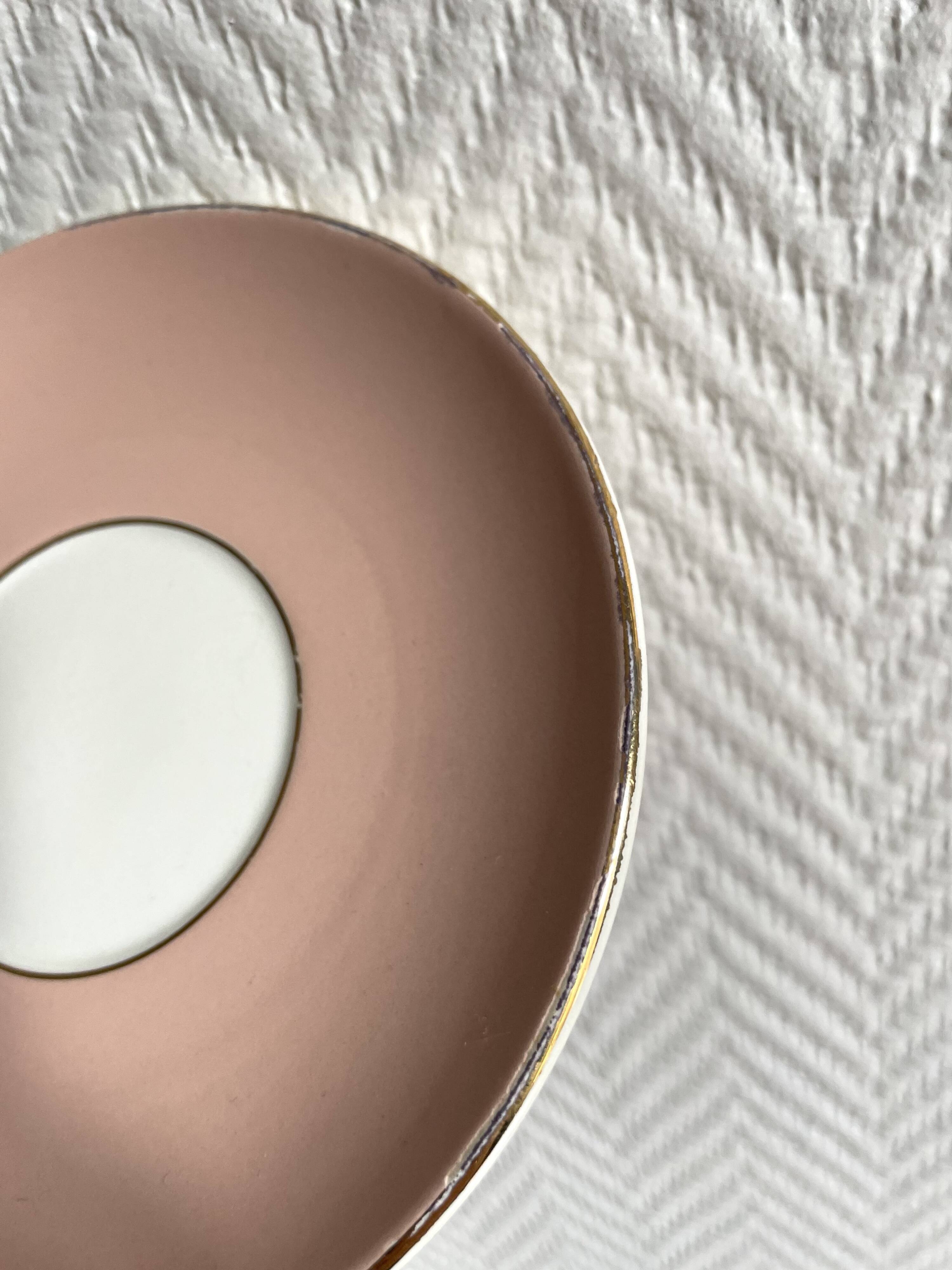 Set of seven pink Villeroy Boch porcelain cups