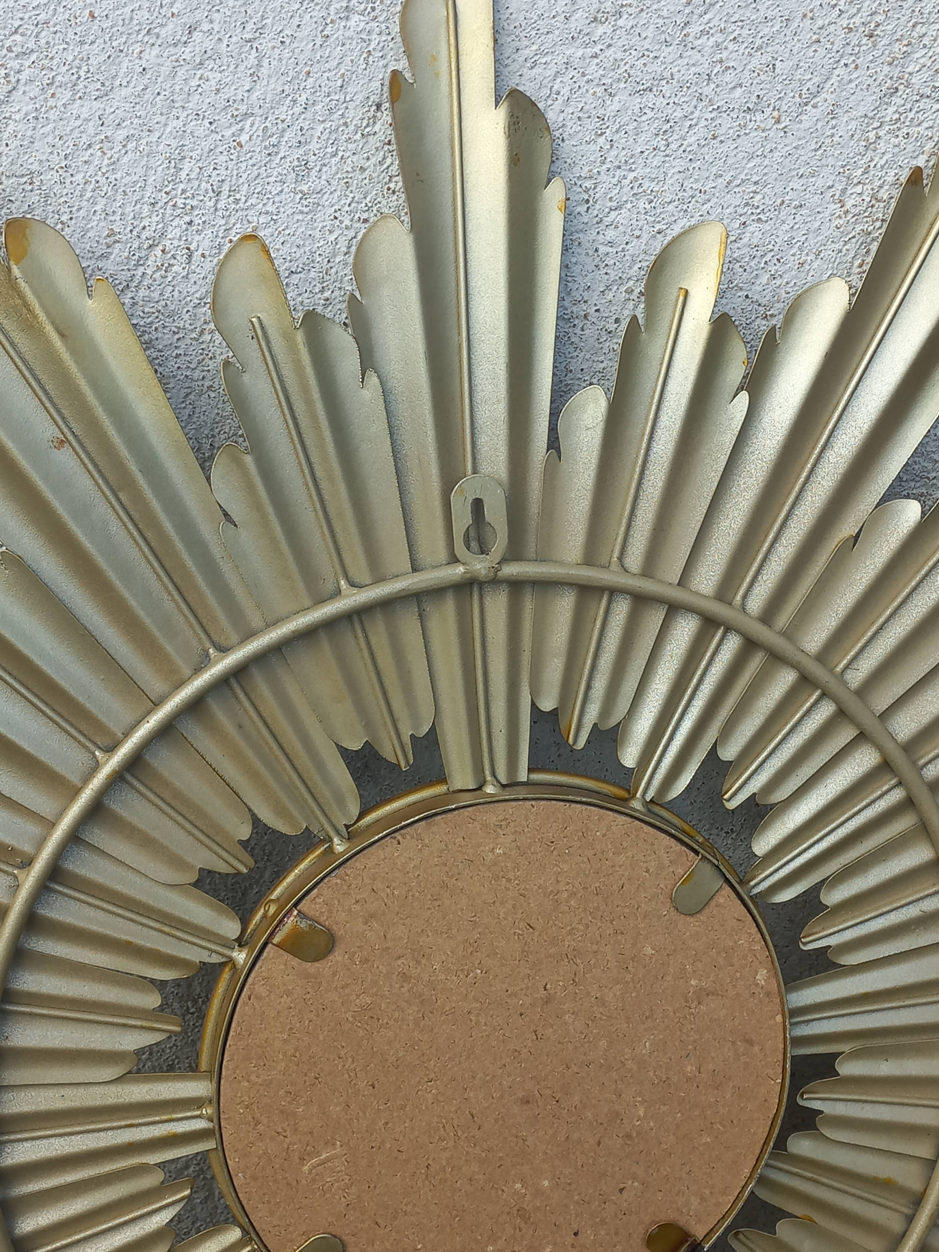 Gold metal sun mirror