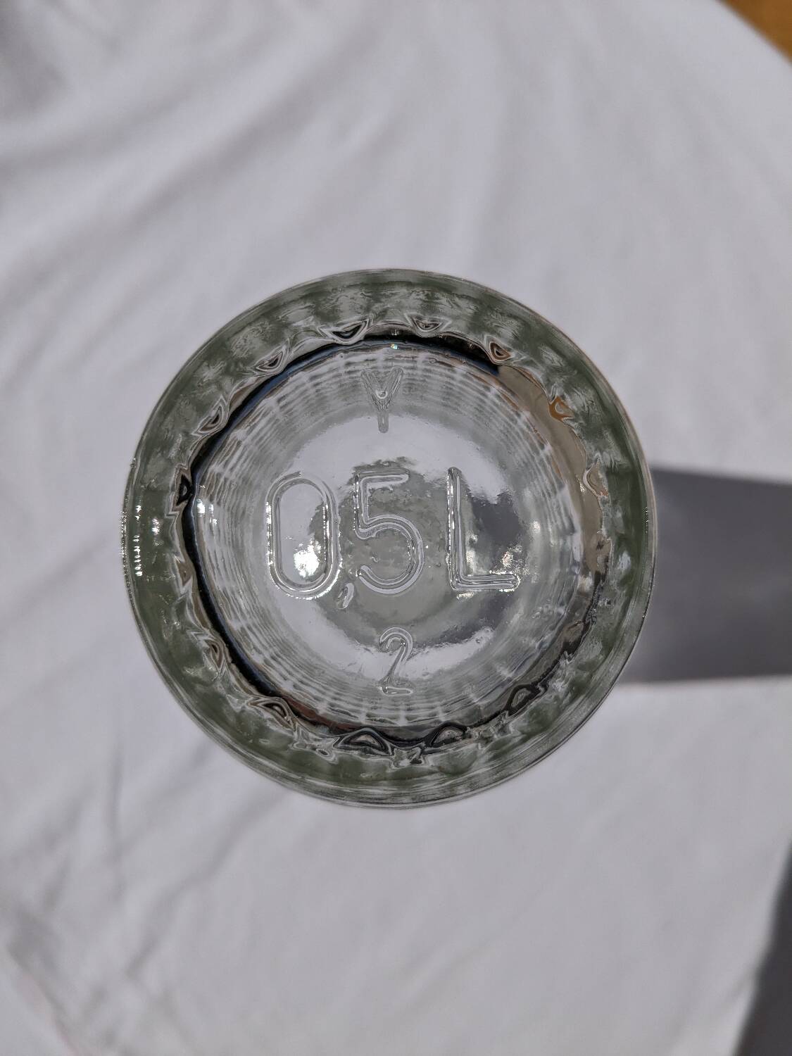 Old relief glass carafe with stopper