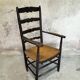 High back straw armchair