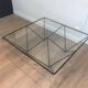 Black lacquered metal coffee table with a clear glass top. Attributed to Paolo Piva.