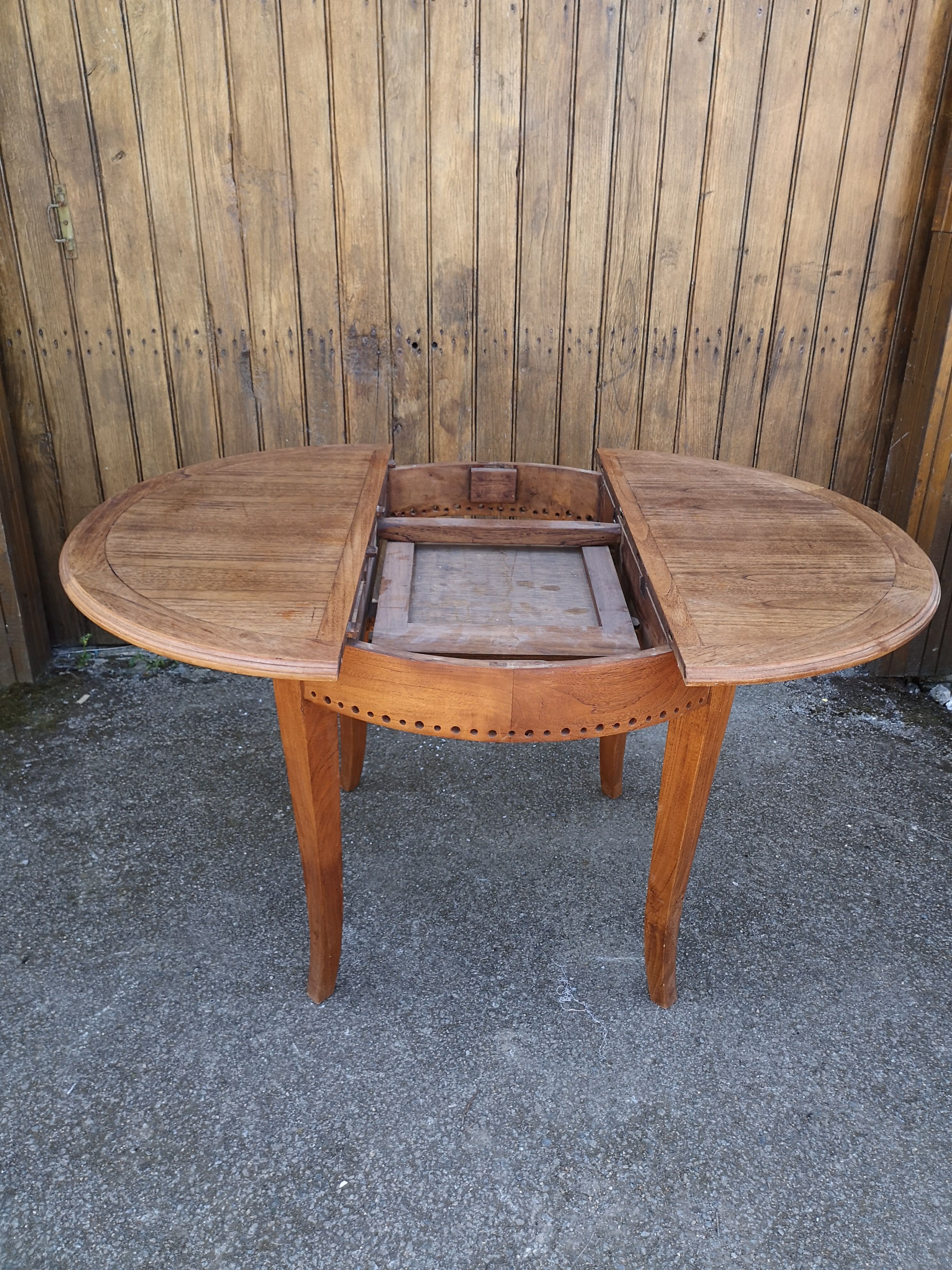 Teak dining table