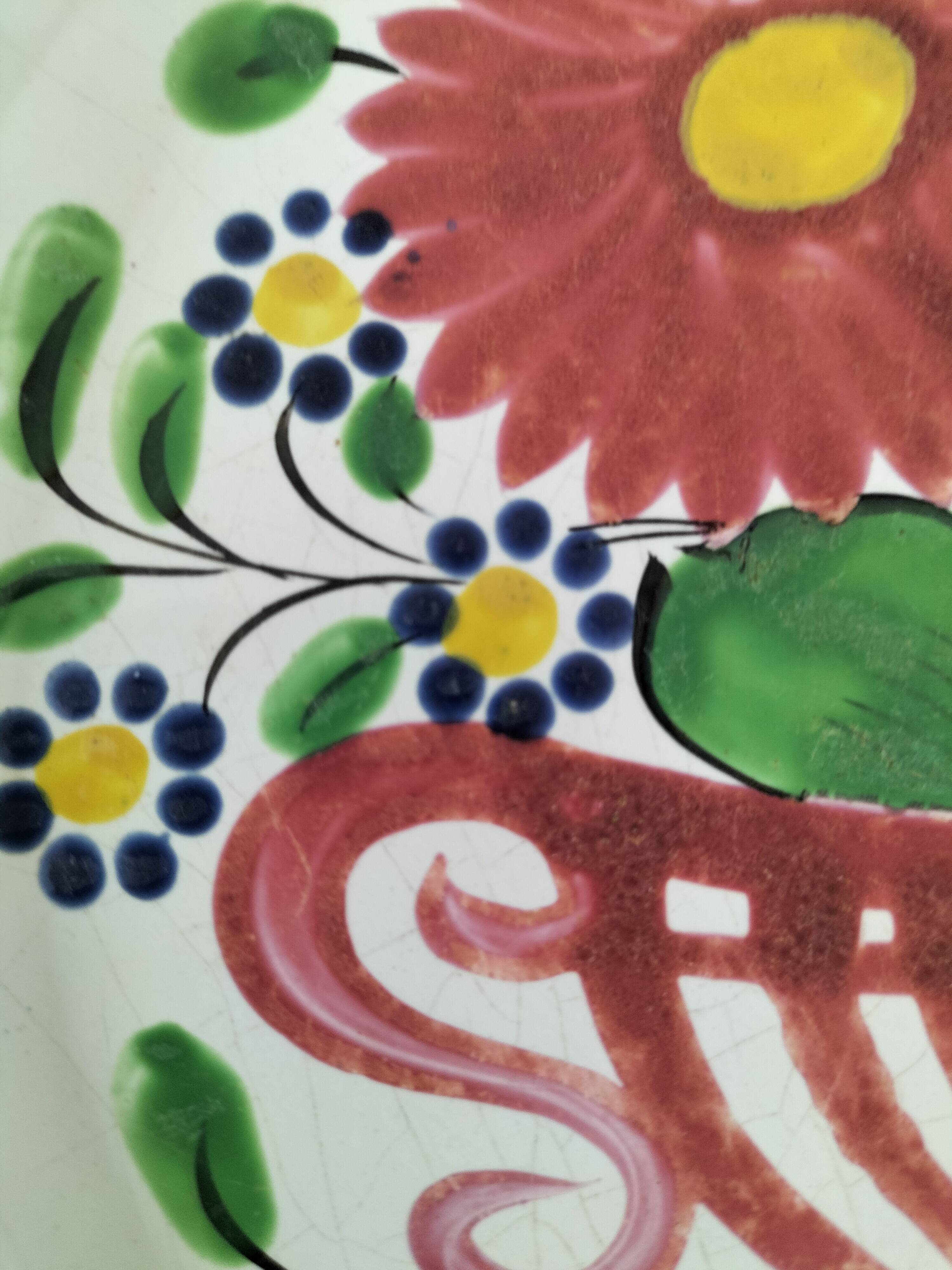 Saint-Clément plate – floral basket decoration with lyre handles – circa 1910