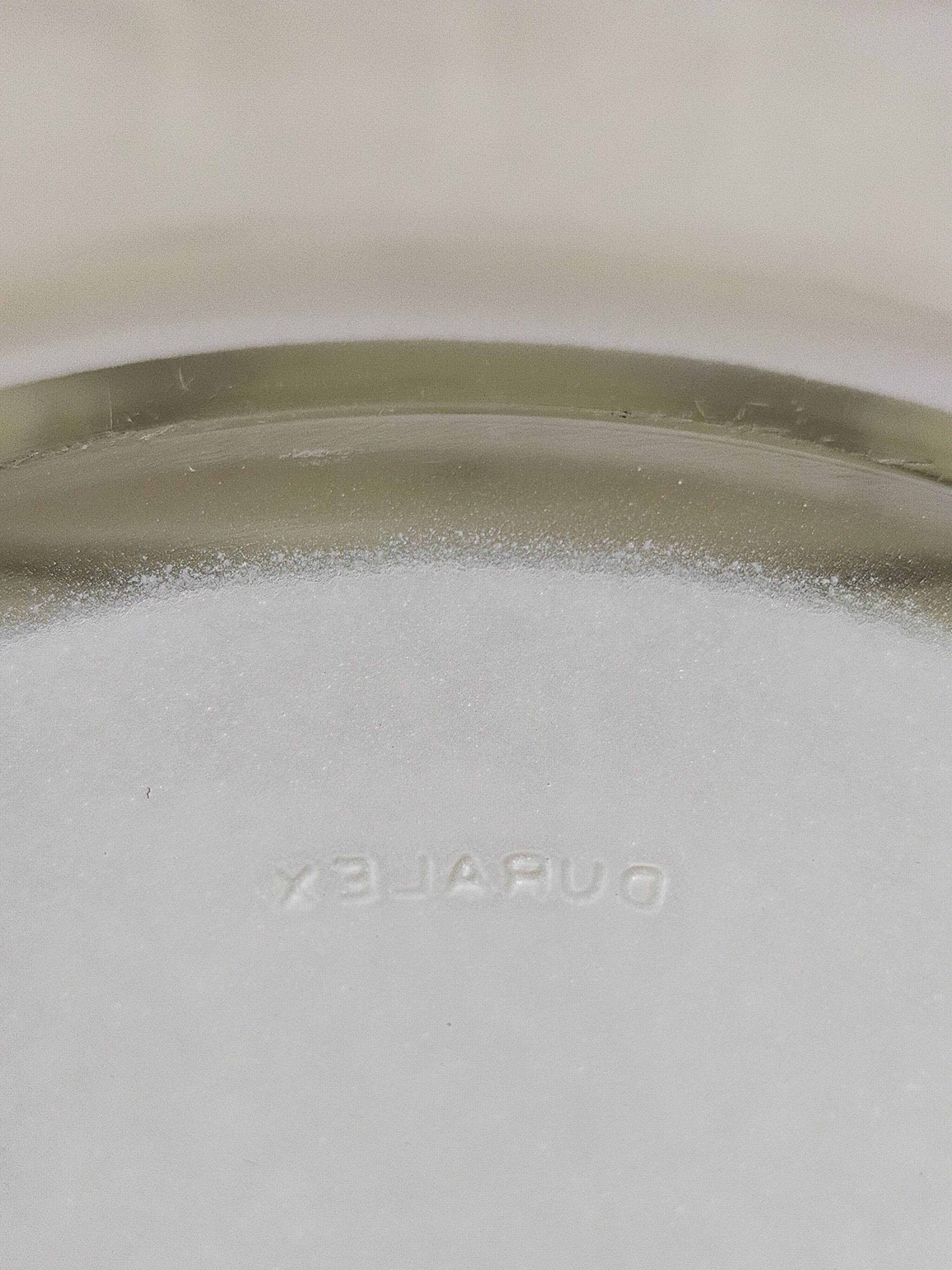 Eight Duralex dessert plates in 60s painted glass