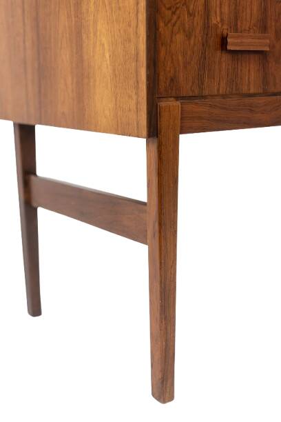 Rosewood chest of drawers with 2 drawers, forming a secretary. 1970s.