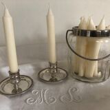Two silver metal candlesticks