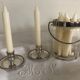 Two silver metal candlesticks