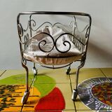 Metal doll's bed on vintage casters