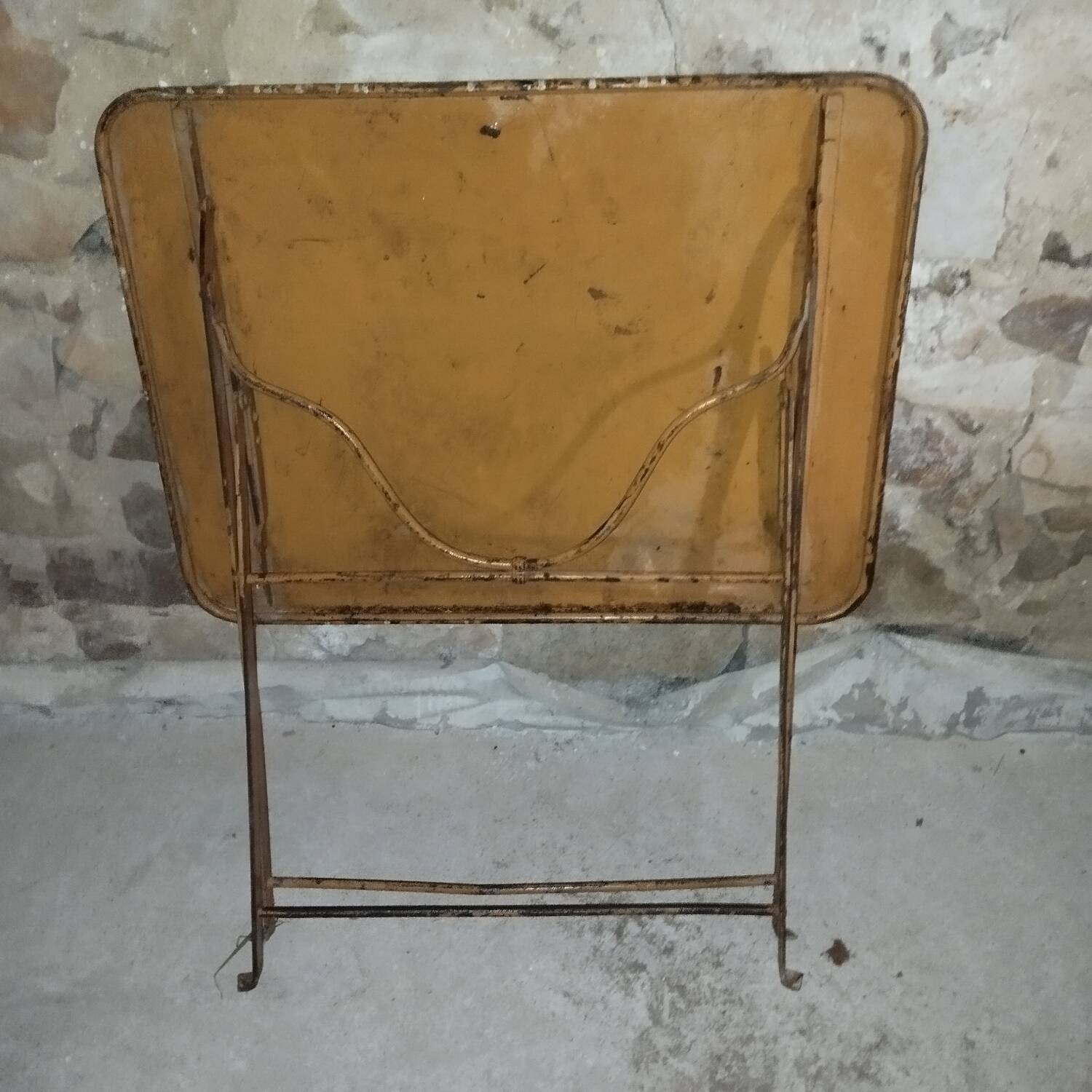 Folding wrought iron garden bistro table