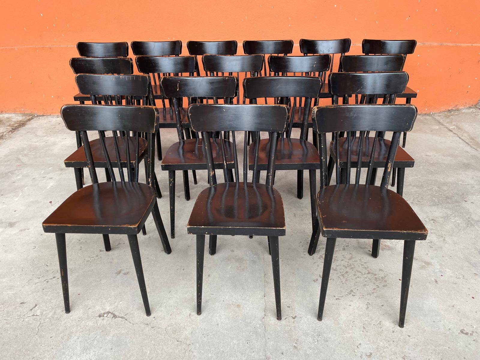 Set of 18 curved wooden bistro chairs with patina from the 60s