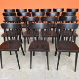 Set of 18 curved wooden bistro chairs with patina from the 60s