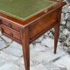 Elegant Louis XVI style mahogany flat desk from the 20th century