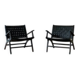 Two numbered black leather designer armchairs – Olivier De Schrijver