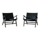 Two numbered black leather designer armchairs – Olivier De Schrijver
