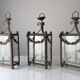 Wrought iron lantern with glass panels, leaf motifs