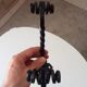 Brutalist wall coat rack in wrought iron.