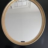 Oval mirror in gilded wood 43x53cm