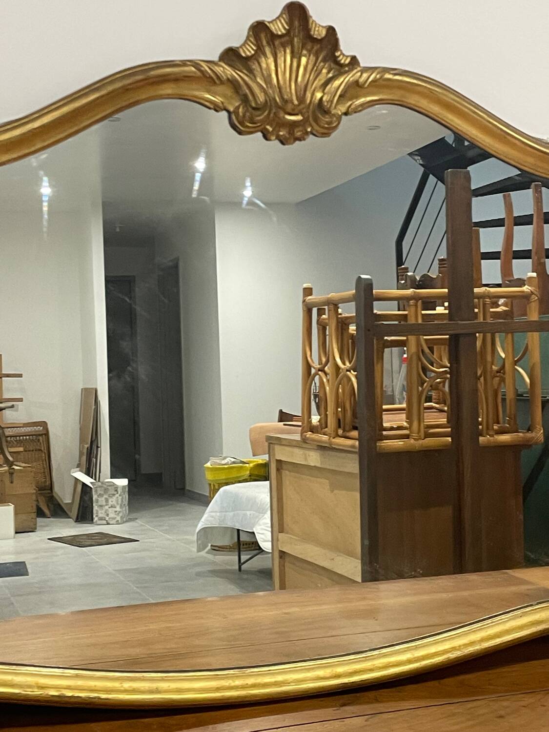 Large vintage mirror with an animated shape and Louis XV baroque style shell
