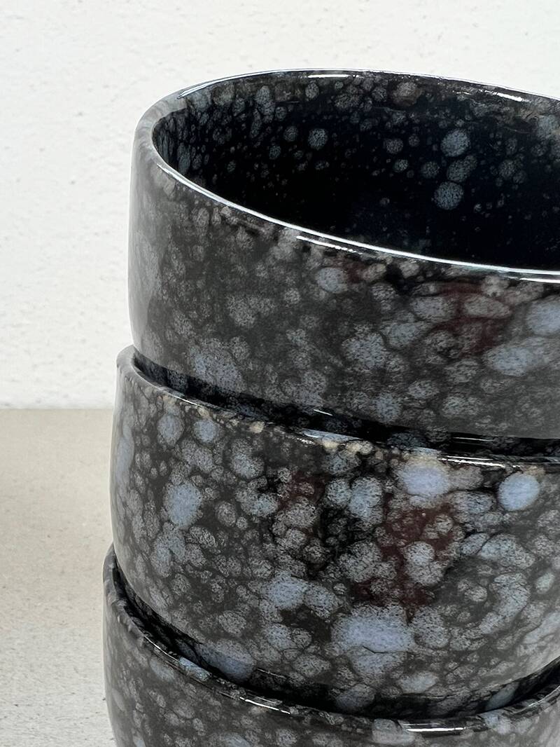Black and gray ceramic mugs