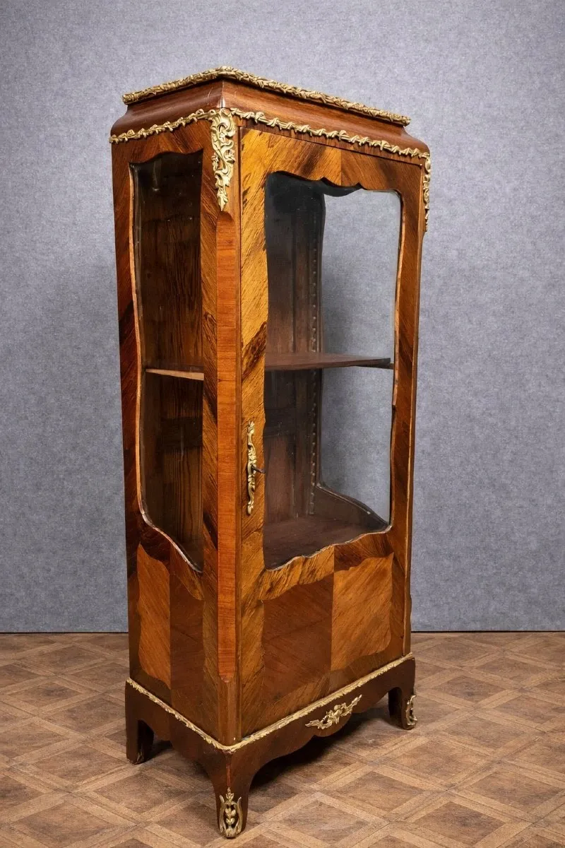 Antique display cabinet in Louis XV / Transition style – marquetry wood and bronze fittings.