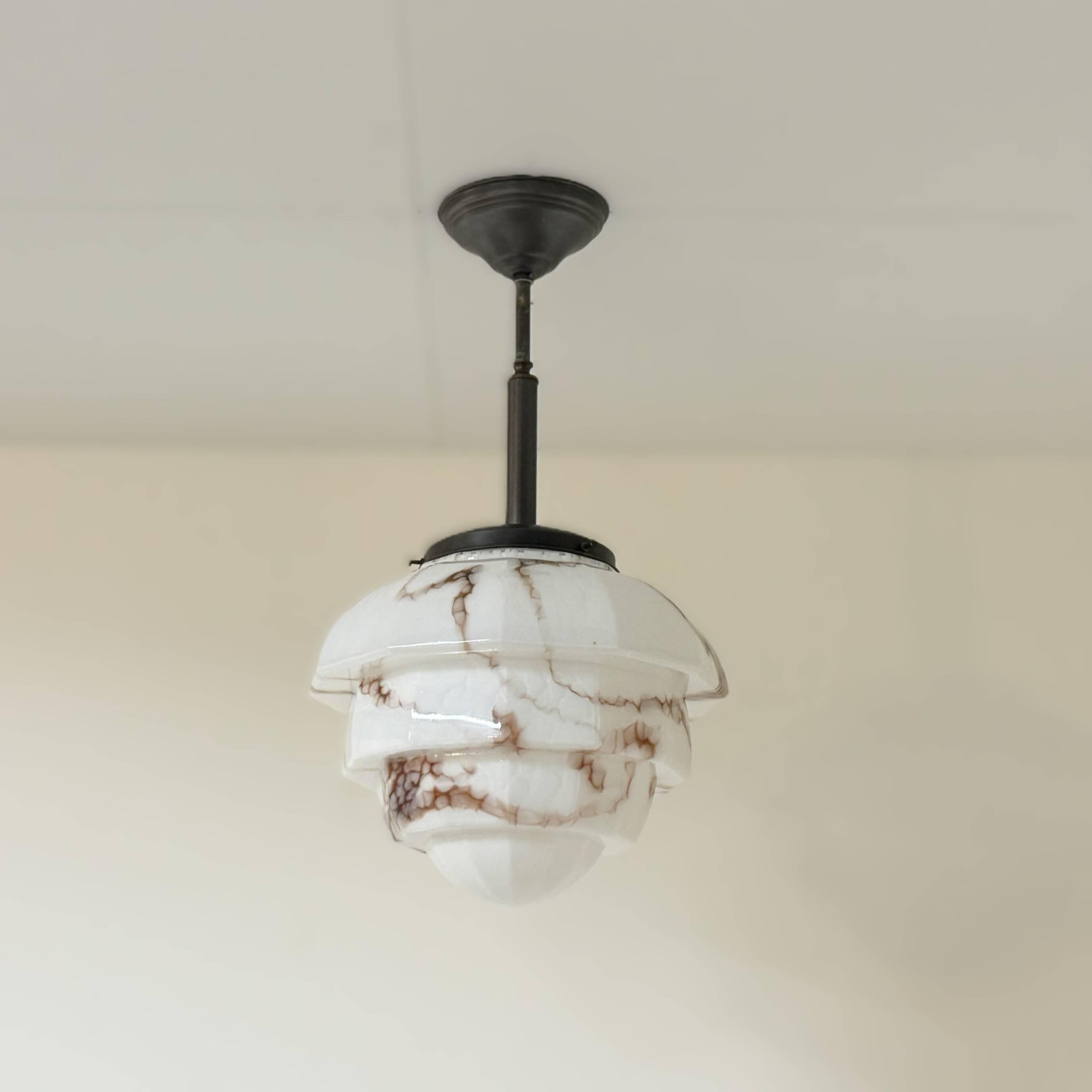 Art Deco pendant lamp with marbled glass shade