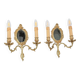 Pair of Louis XV style beveled mirror sconces in bronze by Lucien Gau